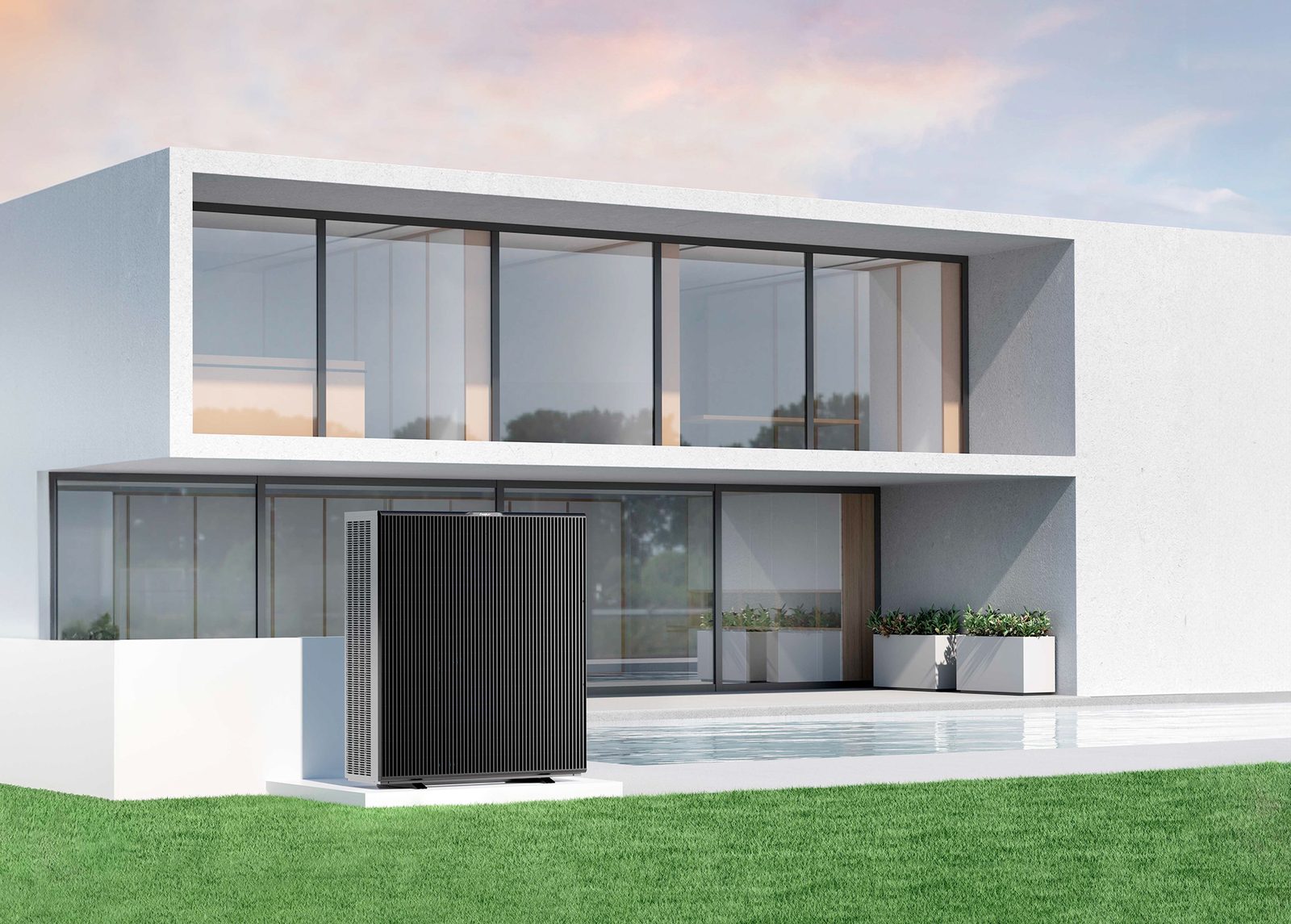 ZEALUX INVERBOOST PLUS R290 Außengerät auf dem Rasen vor einem modernen Wohnhaus. Produktfoto: ZEALUX.